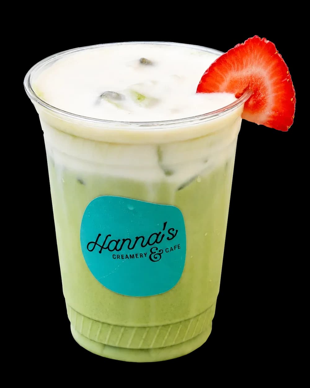 A layered green drink in a Hanna’s branded cup